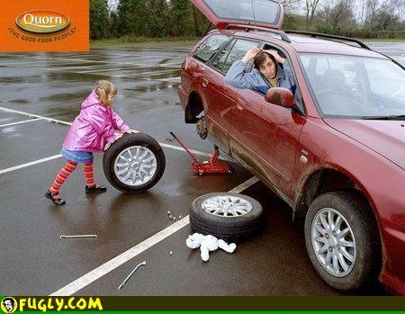 kid_changing_the_tire.jpg